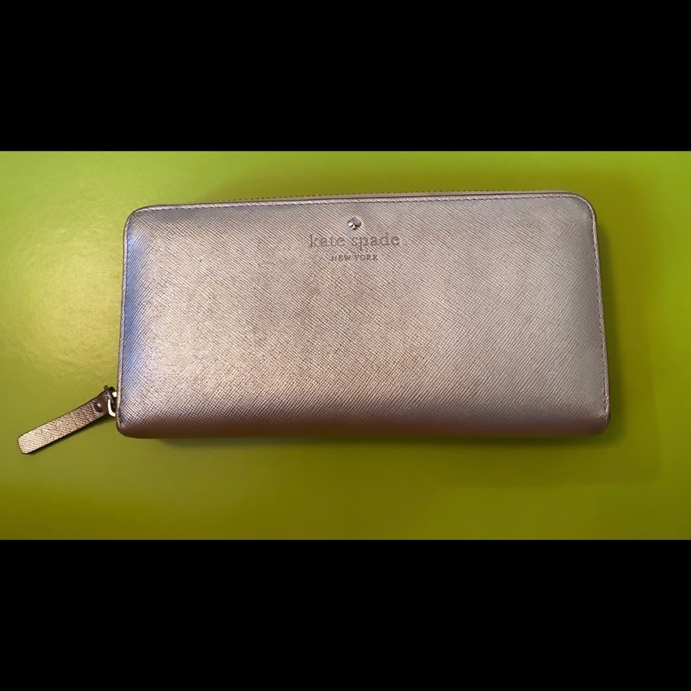 Kate Spade gold wallet slightly used condition